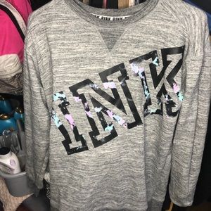 a grey PINK crew neck